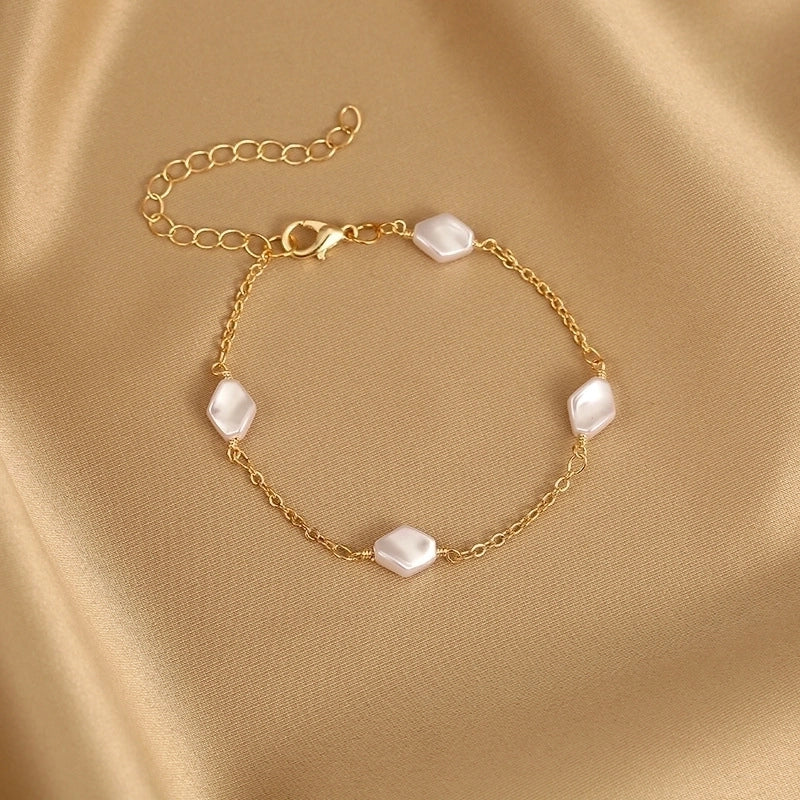 Minimalist Bracelet With Geometric Pearl Accents
