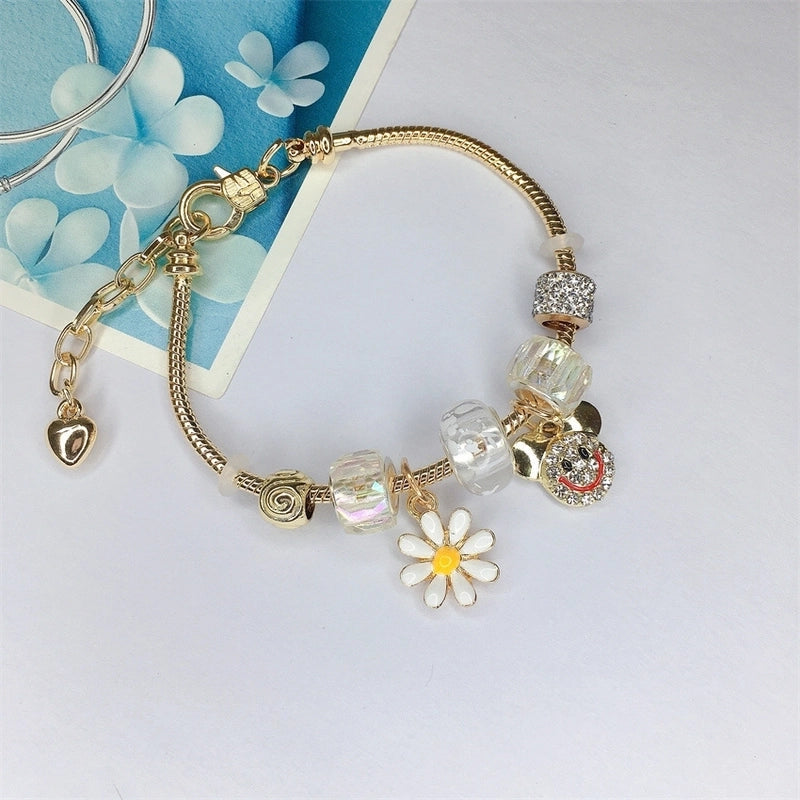 Pink and Gold Charm Bracelet