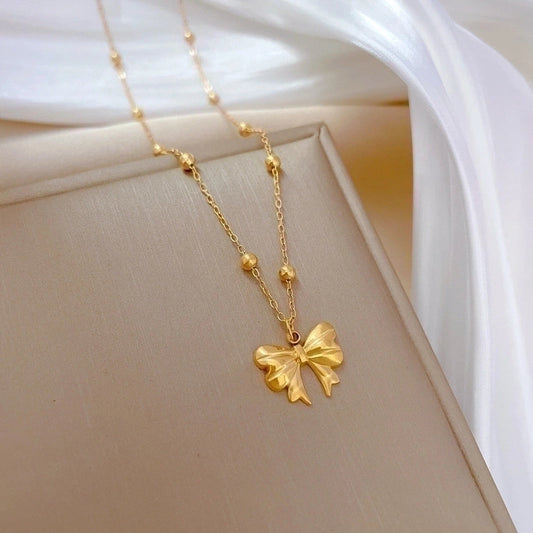 Gold Bow Pendant Necklace