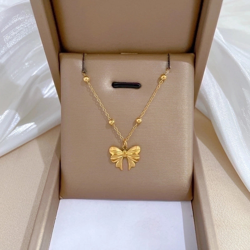 Gold Bow Pendant Necklace
