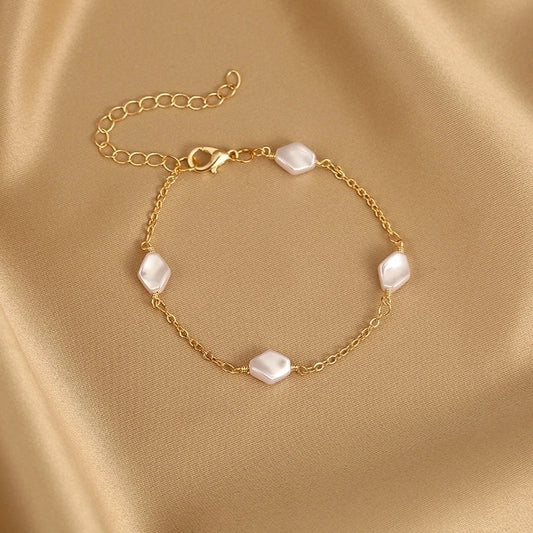 Minimalist Bracelet With Geometric Pearl Accents