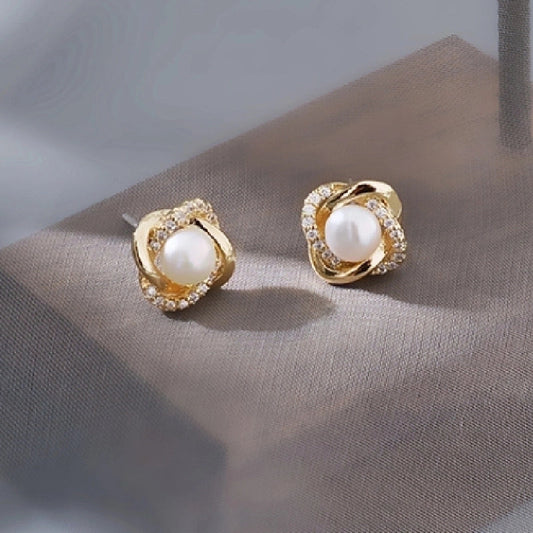 Elegant Pearl Stud Earrings with Gold and Crystal Twist Design